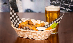 Chicken Wings and beer served at the WinSport Hockey House