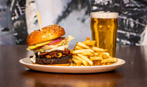 burger and fries serves at the WinSport Hockey House