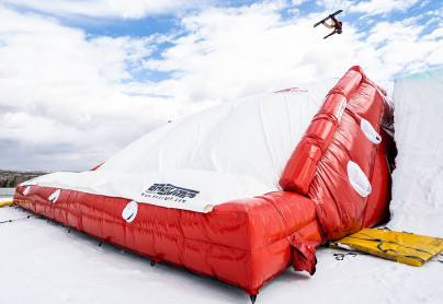 Snowboarder using the Winter Halfpipe airbag at WinSport